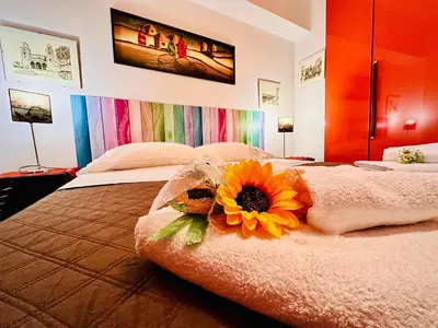 Letto o letti in una camera di CasaMalù