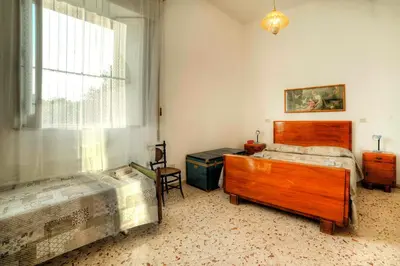 Letto o letti in una camera di Villa with pool and tennis court