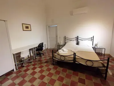 Letto o letti in una camera di Casa SOLE