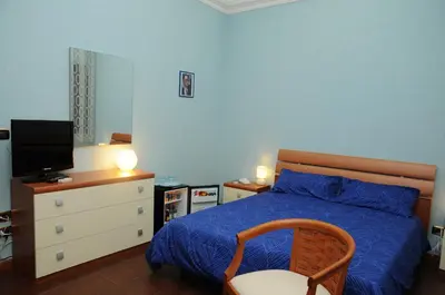 Letto o letti in una camera di Affittacamere Conte Di Cavour