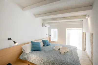 Letto o letti in una camera di Residence Ortigia