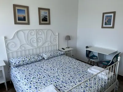 Letto o letti in una camera di Ortigia D'aMare