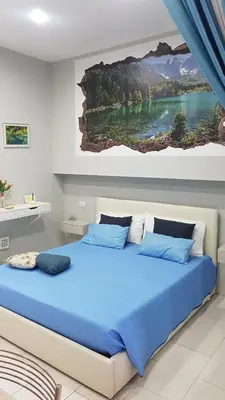 Letto o letti in una camera di Cataleya