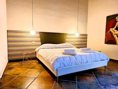 Letto o letti in una camera di Casa Aretusa - Ortigia Holidays