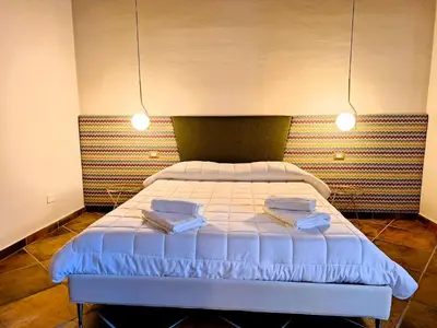 Letto o letti in una camera di Casa Aretusa - Ortigia Holidays