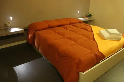 Letto o letti in una camera di Specula Domus - Ibla
