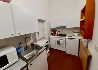 Cucina o angolo cottura di Elegante appartamento in palazzo storico Ortigia