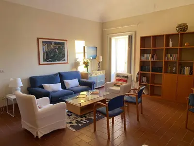 Area soggiorno di Elegante appartamento in palazzo storico Ortigia