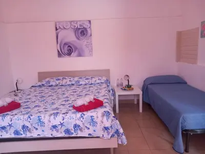 Letto o letti in una camera di Bed and fly Aeroporto Fontanarossa bagno privato in camera