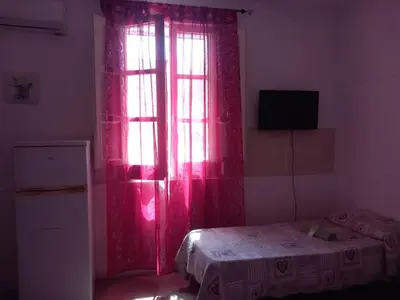 Letto o letti in una camera di Bed and fly Aeroporto Fontanarossa bagno privato in camera