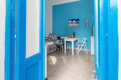 TV o dispositivi per l'intrattenimento presso SyracuseApartments IL PASUBIO di SIRACUSA Stupendo appartamento vicino ad ORTIGIA a 200m dal MARE