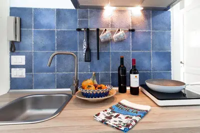 Cucina o angolo cottura di SyracuseApartments IL PASUBIO di SIRACUSA Stupendo appartamento vicino ad ORTIGIA a 200m dal MARE