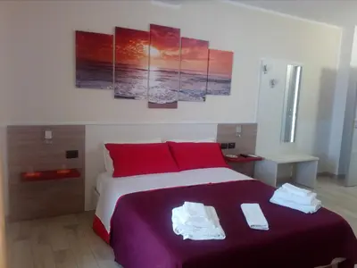 Letto o letti in una camera di Rooms STELLA POLARE