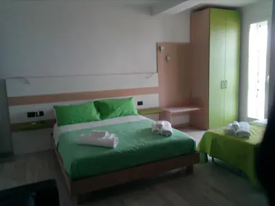 Letto o letti in una camera di Rooms STELLA POLARE