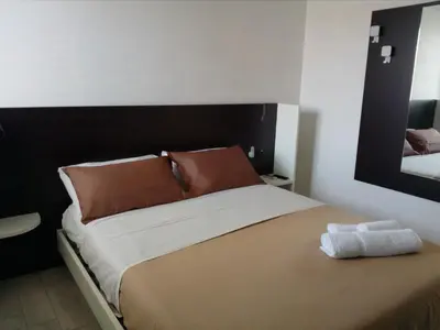 Letto o letti in una camera di Rooms STELLA POLARE
