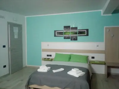 Letto o letti in una camera di Rooms STELLA POLARE