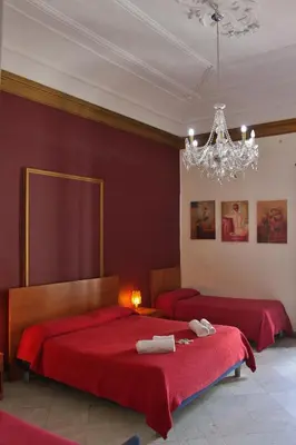 Letto o letti in una camera di B&B Opera Catania Centro Storico