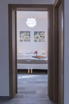 Letto o letti in una camera di Villa Pasitea fronte mare
