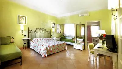 Letto o letti in una camera di iGV Club Marispica