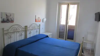 Letto o letti in una camera di Casa Badia