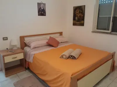 Letto o letti in una camera di Villa Lory