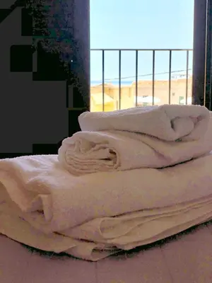 Letto o letti in una camera di Casa Vacanza 
