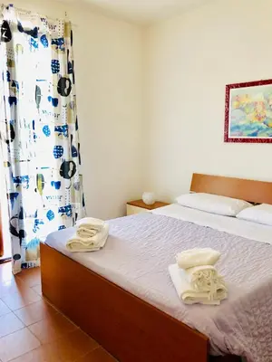 Letto o letti in una camera di Casa Vacanza 