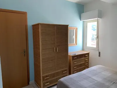Letto o letti in una camera di Hotel Il Triangolo