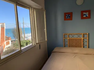 Letto o letti in una camera di Hotel Il Triangolo