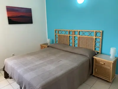 Letto o letti in una camera di Hotel Il Triangolo