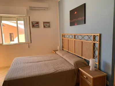 Letto o letti in una camera di Hotel Il Triangolo