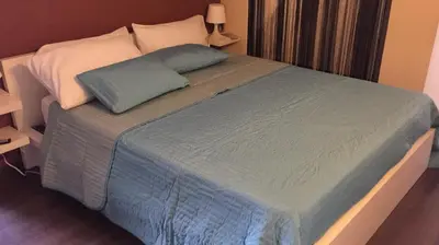 Letto o letti in una camera di Two Steps Ortygia