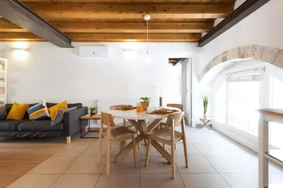 Area soggiorno di Ortigia Suite - Theater