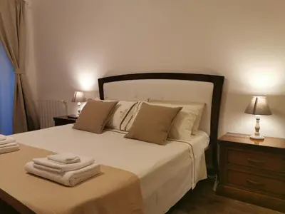 Letto o letti in una camera di Eschilo Luxury House