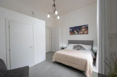 Letto o letti in una camera di Palazzo Bruca Catania
