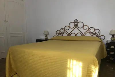 Letto o letti in una camera di Le tre Palme