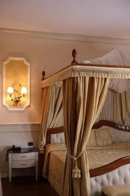 Letto o letti in una camera di Borgo Don Chisciotte