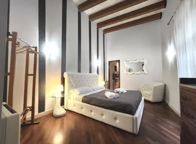 Letto o letti in una camera di Maison Maniace