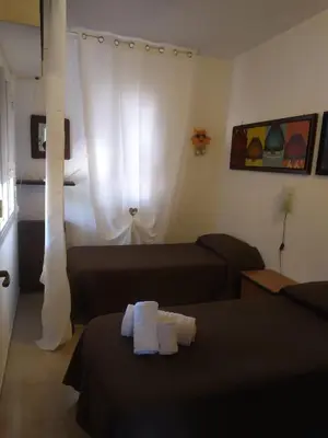 Letto o letti in una camera di Villa al Plemmirio