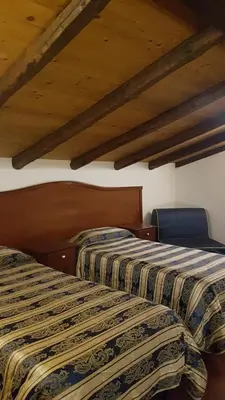 Letto o letti in una camera di Hotel Sangiuliano 132 centro storico Catania