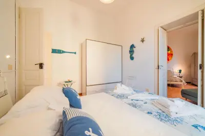 Letto o letti in una camera di Ortigia ART & DesiGn, Parking , Smartworking