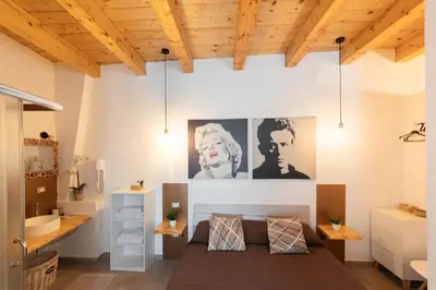 Letto o letti in una camera di Dolce Rame Ortigia