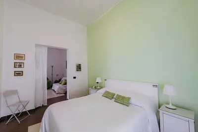 Letto o letti in una camera di Kyanos Residence