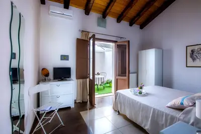 Letto o letti in una camera di Kyanos Residence