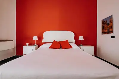 Letto o letti in una camera di Kyanos Residence
