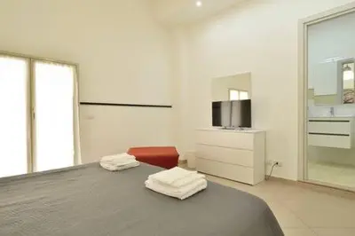 Letto o letti in una camera di ragusa curtigghiu