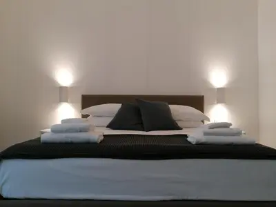 Letto o letti in una camera di Chiaralice