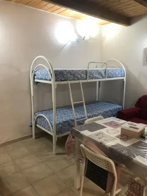 Letto o letti in una camera di Sweet home
