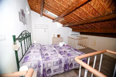 Letto o letti in una camera di Sweet home
