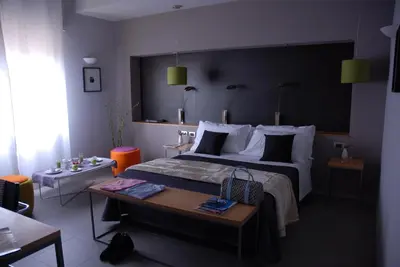 Letto o letti in una camera di B&B Habita